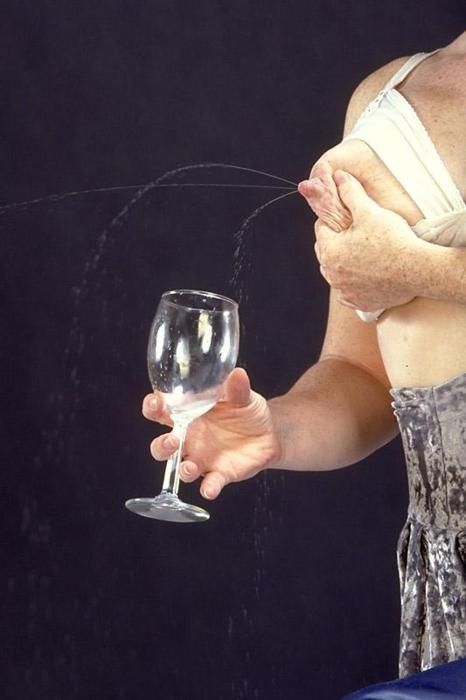#lactating #boobs squirting milk into a wine glass