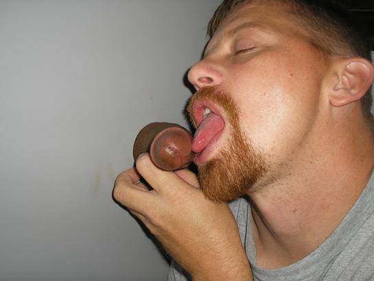 licking-his-black-cock