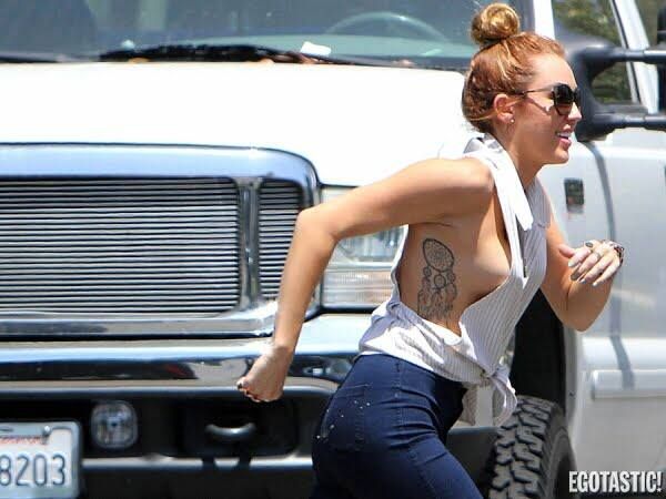 Miley-Cyrus-Sideboob-Run-01-600x450