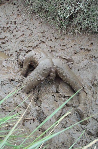 naked in mud