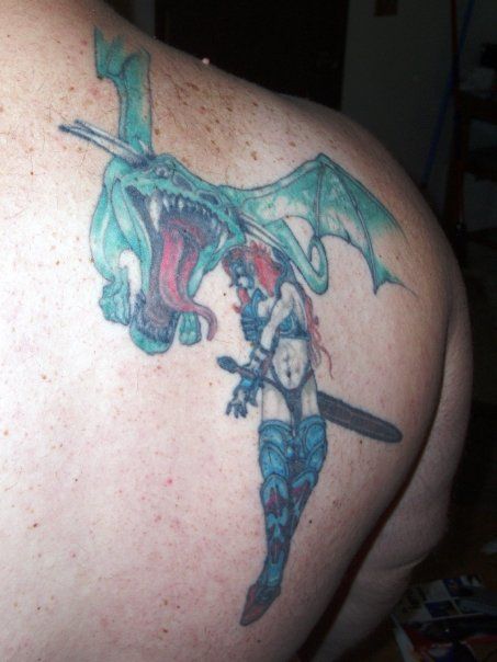 Fantasy Tattoo On Upper Right Back