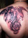 Gothic Tattoo On Left Upper Back