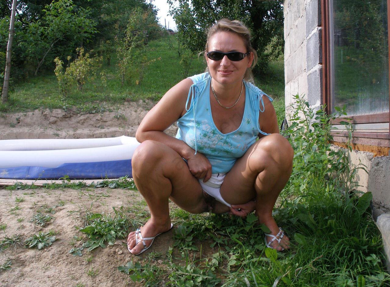 lovely pissing lady outdoors
