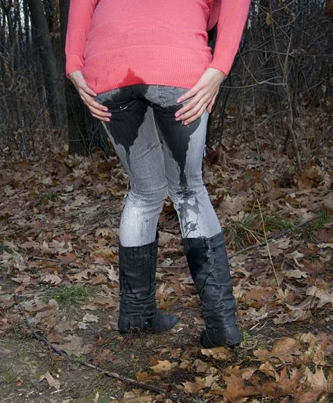 peeing-her-jeans-in-forest