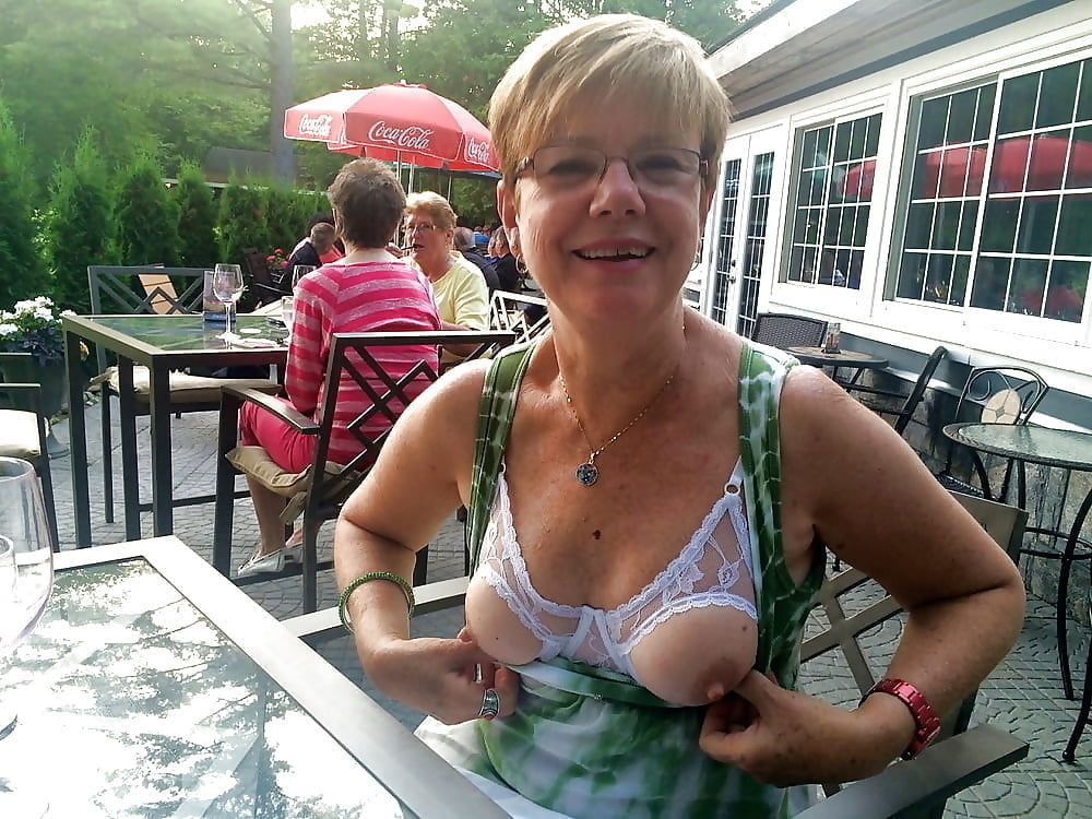 mature flashing tits