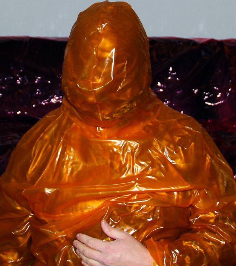 Shiny transparent orange rainjacket