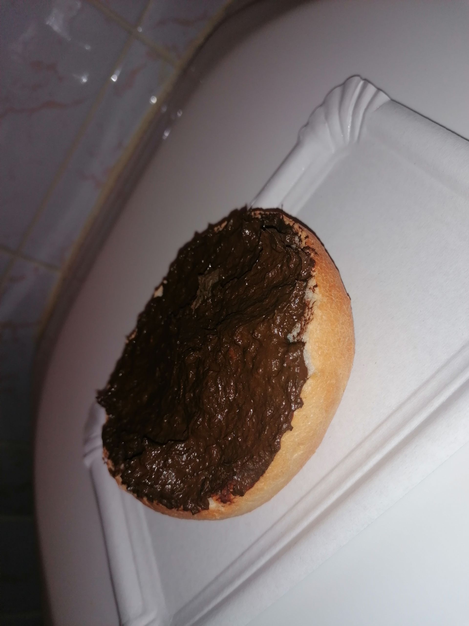 Bread roll with shit looks like Nutella
