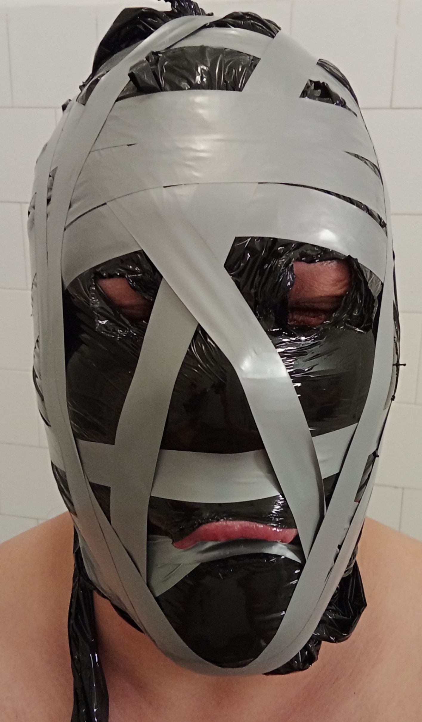 Saran wrap and duct tape cover cocksucker head loyal sex slave