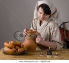 stock-photo-medieval-or-fantasy-tavern-serving-girl-89198329
