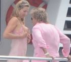 Penny_Lancaster_Offers_Her_Boob_To_Rod_Stewart-3