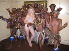 Blonde with African musicians