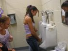 Girls Using a Funnel to Pee in the Urinal