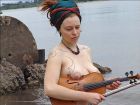 busty_instrument_music_outdoor_pale_redhead_redhead-gals_tattoo_violin_water_9