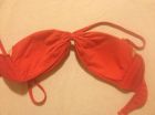 Inside red bikini top