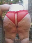 Red crotchless panties and big ass.