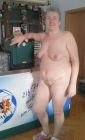 Shaved grandma posing nude