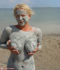 Mud-covered-nudist-MILF-682x800