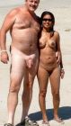 older-guy-with-fat-shaved-cock-on-a-nude-beach-with-his-asian-girl-with-firm-tits-and-shaved-pussy_t