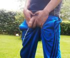 pic1_hung_uncut_lad_trackies_down_big_fat_cock_out_pissing_003