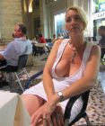 blonde-nude-under-white-dress-in-restaurant-5127