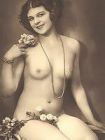 t-seductive-girl-small-breasts-covers-pussy-flowers