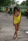 Teen-girl-in-yellow-dress-shows-her-very-sweet-pussy-at-public-park-5