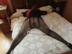 Wife tied and blindfolded on bed