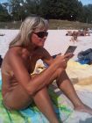 Lana reading at beach